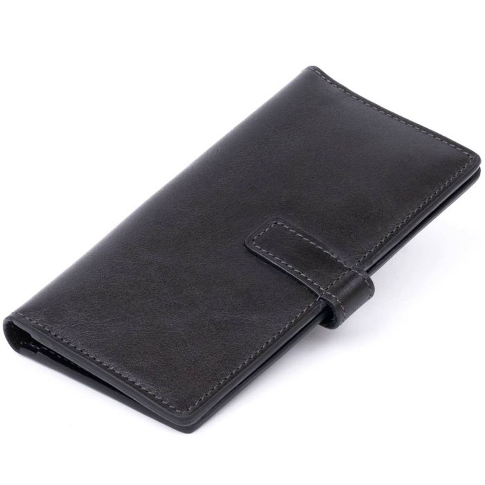 Вертикальний гаманець глянцевий Anet на кнопці Grande Pelle 11324 чорний