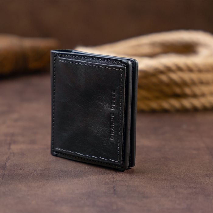Вертикальне глянсове портмоне з накладною монетницею Grande Pelle 11329 чорне