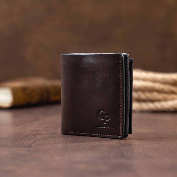 Вертикальне глянсове портмоне з накладною монетницею Grande Pelle 11330
