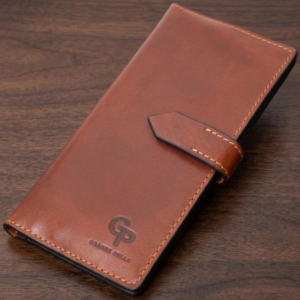 Цікавий вертикальний гаманець із натуральної шкіри Grande Pelle 11660 коричневий