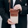 Міні сумка чохол для телефону, панч Grande Pelle 70374323 комбінована (70374323)